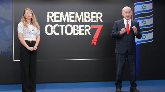 בנימין נתניהו וסבין תעסה בהצהרה שפורסמה בעולם לצד חלק מסרטון הזוועות (צילום: עמוס בן גרשום, לע"מ)