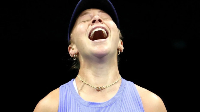 אמנדה אניסימובה חוגגת את ההעפלה לגמר אליפות ארה"ב (צילום: רויטרס)