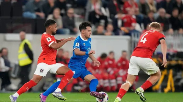 לויזו בכחול, במדי נבחרת קפריסין (צילום: GettyImages, Guenther Iby/SEPA.Media)