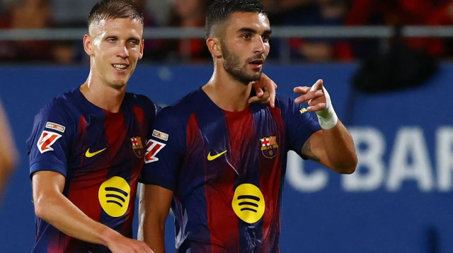 שחקני ברצלונה פראן טורס, דני אולמו (צילום: רויטרס)