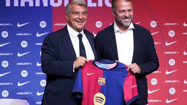 האנזי פליק וז'ואן לאפורטה (צילום: Xinhua News Agency)