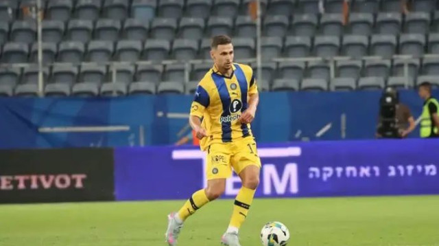 מרוצה. כריסטיאן בליץ' (צילום: אתר רשמי, מכבי תל אביב בכדורגל)