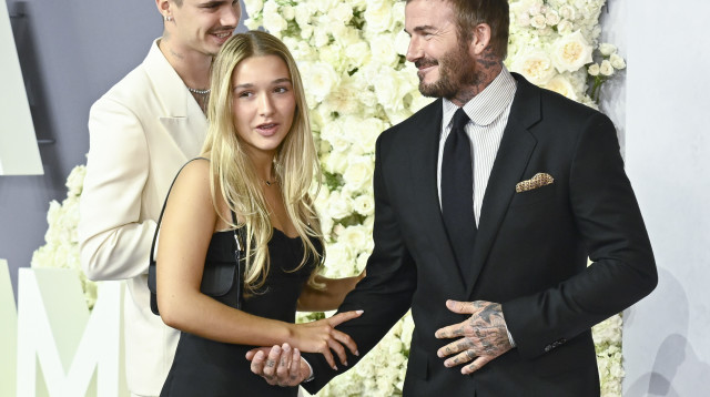 דיוויד בקהאם ובתו הרפר (צילום: Gareth Cattermole/Getty Images)