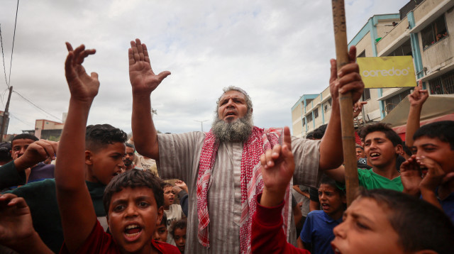 בעזה מציינים את הסכם הפסקת האש (צילום:  OMAR AL-QATTAA/AFP )