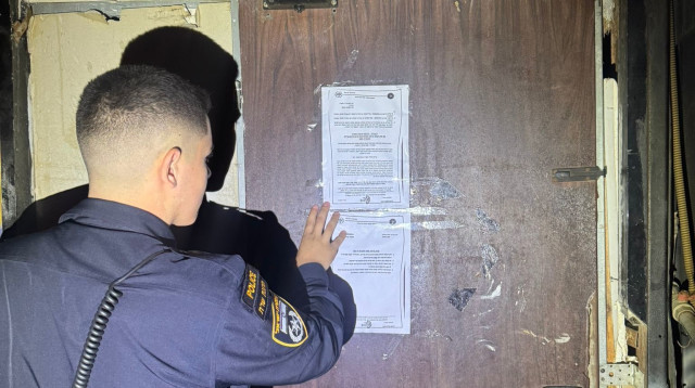 סגירת בית בושת (צילום: דוברות המשטרה)