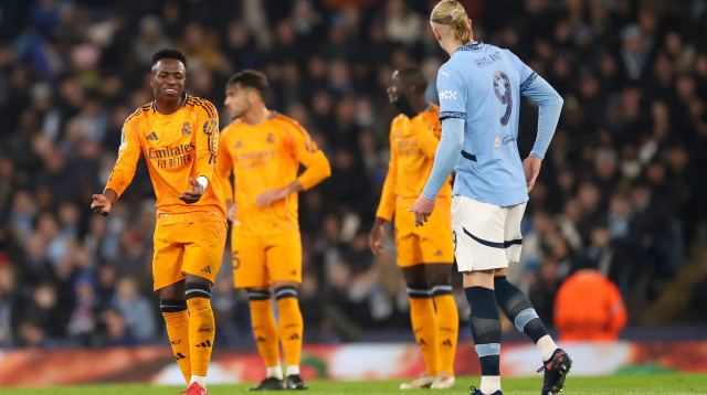 ויניסיוס שחקן ריאל מדריד מגיב לשער של ארלינג הולאנד שחקן מנצ'סטר סיטי (צילום: GettyImages, Carl Recine)