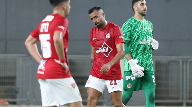 שחקני הפועל תל אביב יזן נסאר, אסף צור (צילום: דני מרון)