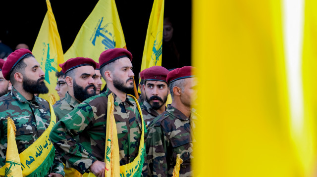 מחבלי חיזבאללה (צילום:  COURTNEY BONNEAU/Middle East Images/AFP via Getty Images)