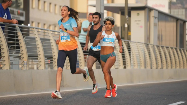 כרואן חלבי קבלאן, אלופת ישראל ב-10 ק"מ (צילום: אתר רשמי, טים נודלמן, שוונג)