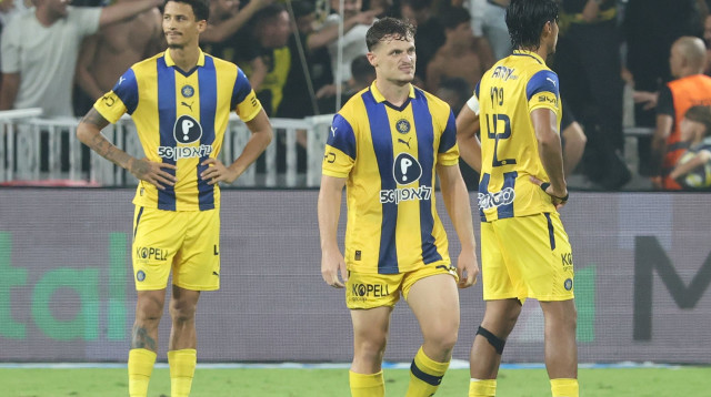 שחקני מכבי תל אביב בהלם (צילום: דני מרון)