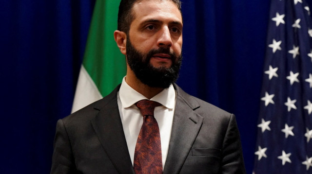 אחמד א-שרע (אל-ג'ולאני) (צילום: REUTERS/Bing Guan/Pool)