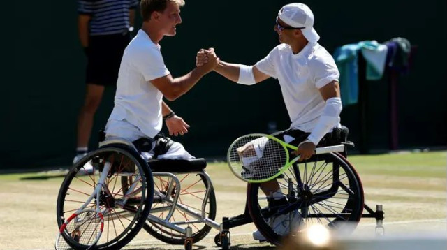 גיא ששון עם נילס וינק בסיום (צילום: GettyImages, Ezra Shaw)