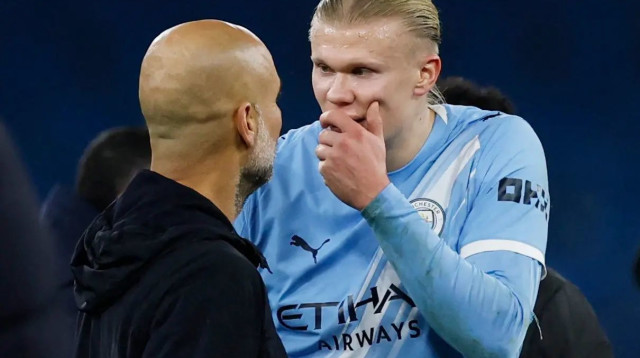 חלוץ מנצ'סטר סיטי ארלינג הולאנד עם פפ גווארדיולה (צילום: רויטרס)