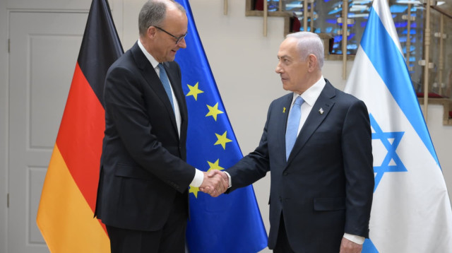 בנימין נתניהו, פרידריך מרץ (צילום: עמוס בן גרשום לע"מ)