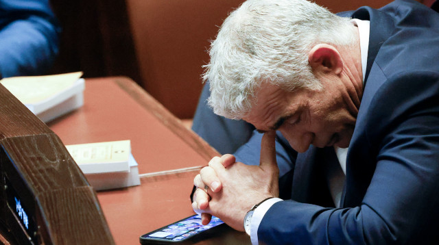 יאיר לפיד (צילום:  AMIR COHEN/POOL/AFP via Getty Images)