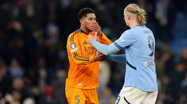 ג'וד בלינגהאם וארלינג הולאנד (צילום: Carl Recine / Staff)