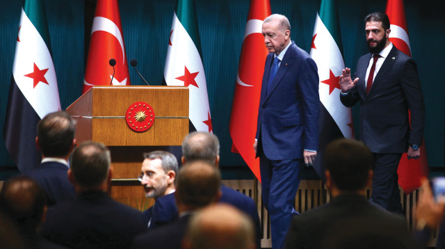 ארדואן ואחמד א-שרע (אל-ג'ולאני) באנקרה (צילום: רויטרס)