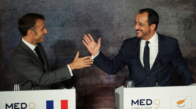 נשיא קפריסין ניקוס כריסטודולידיס ונשיא צרפת עמנואל מקרון  (צילום: רויטרס)