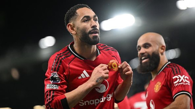 מתאוס קוניה ובריאן אמבומו (צילום: PETER POWELL)