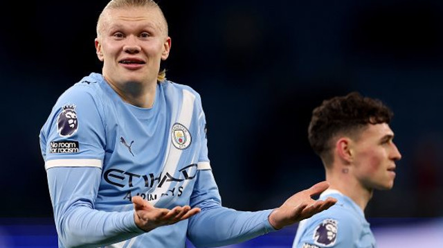 ארלינג הולאנד ופודן (צילום: Carl Recine / Staff)