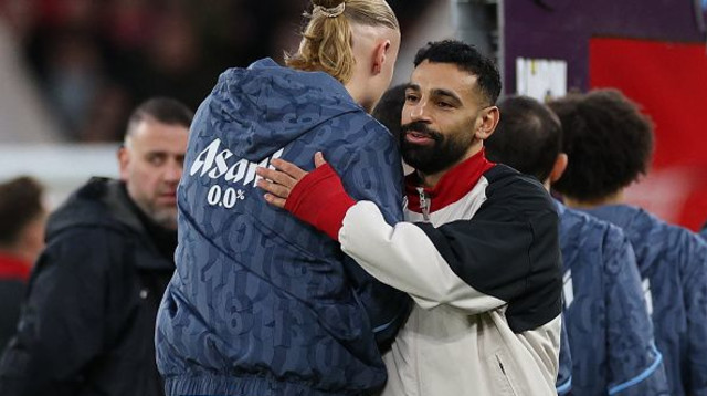 מוחמד סלאח וארלינג הולאנד (צילום: ADRIAN DENNIS)