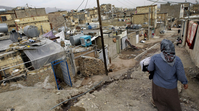 עוני באיראן (צילום:  BEHROUZ MEHRI/AFP via Getty Images)