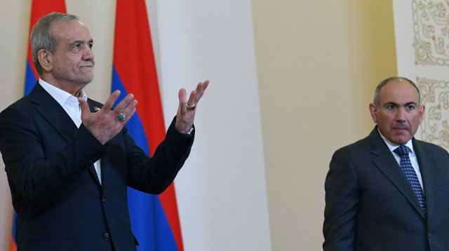 מסעוד פזשכיאן וניקול פשיניאן (צילום: KAREN MINASYAN/AFP via Getty Images))