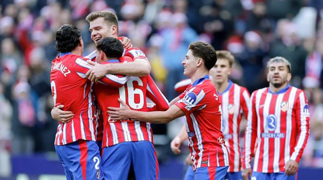שחקני אתלטיקו מדריד חוגגים (צילום: GettyImages)