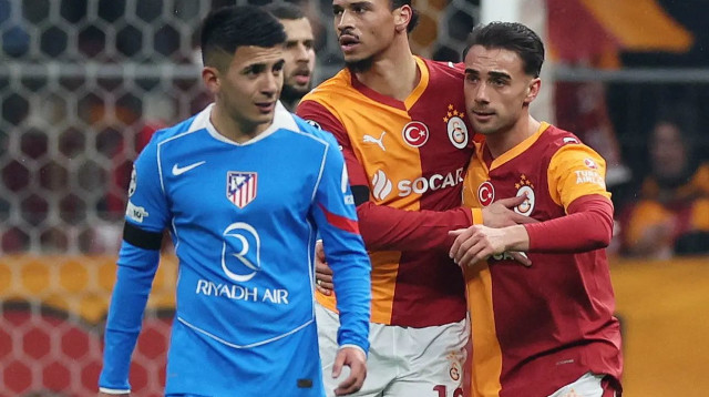 לירוי סאנה, יונוס אקגון, שחקני גלאטסראיי חוגגים מול אתלטיקו מדריד (צילום: רויטרס)