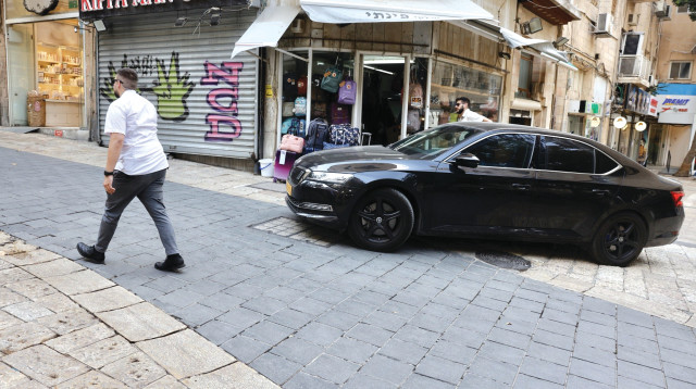 מספרה בירושלים (צילום: מרק ישראל סלם)