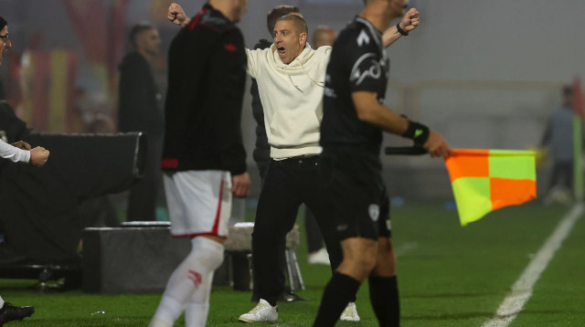 רן קוז'וך מאמן שחקן הפועל באר שבע (צילום: לירון מולדובן)