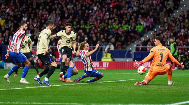 קוברסי כובש מול אתלטיקו מדריד (צילום: GettyImages)