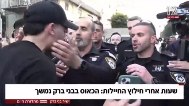 מפכ"ל המשטרה דני לוי ומרדכי דוד (צילום: צילום מסך קשת 12)