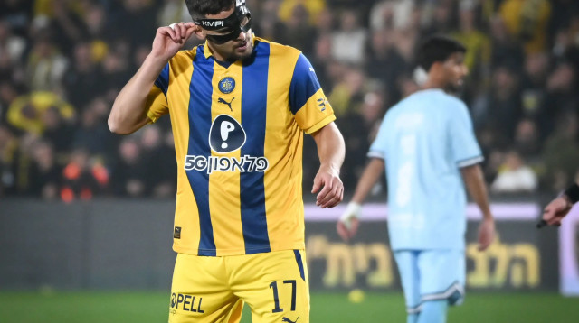 שחקן מכבי תל אביב כריסטיאן בליץ' (צילום: ברני ארדוב)