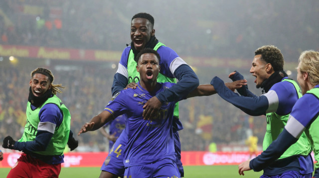 שחקני מונאקו חוגגים עם אנסו פאטי (צילום: GettyImages, FRANCOIS LO PRESTI/AFP)