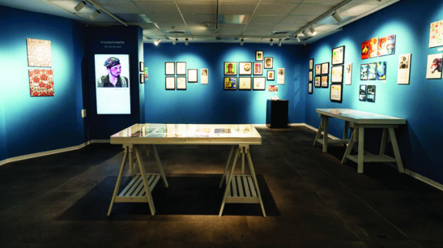 חדר "גיבורי החיל וגיבורות המלחמה" בתערוכת האיור והקומיקס "גיבורים כחול לבן"  (צילום: המוזיאון הישראלי לקריקטורה וקומיקס)