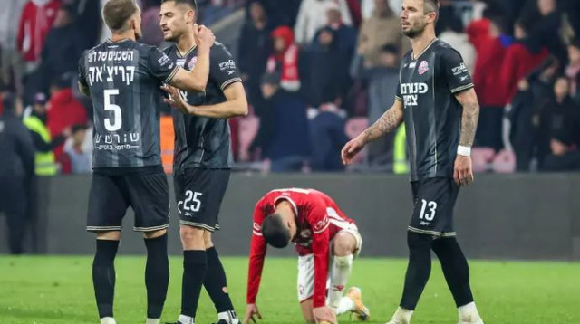 שחקני הפועל חיפה (צילום: קובי אליהו)