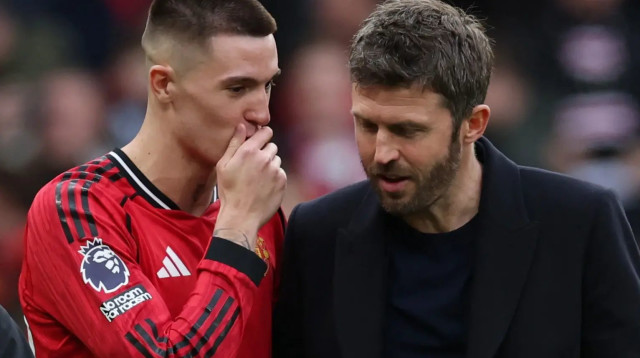 מאמן מנצ'סטר יונייטד, מייקל קאריק, עם בנימין ששקו (צילום: רויטרס)