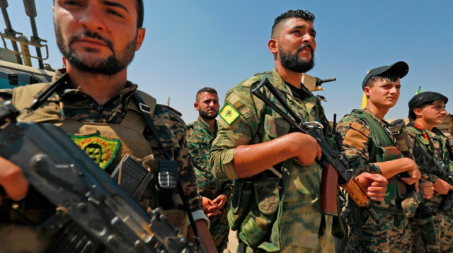 לוחמים כורדים עיראקים (צילום: רשתות ערביות)