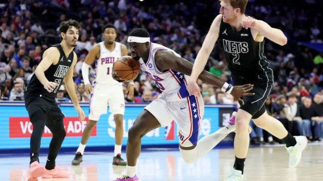 וולף ושרף מנסים לעצור את אדם בונה (צילום: אימג'בנק  GettyImages, Emilee Chinn)