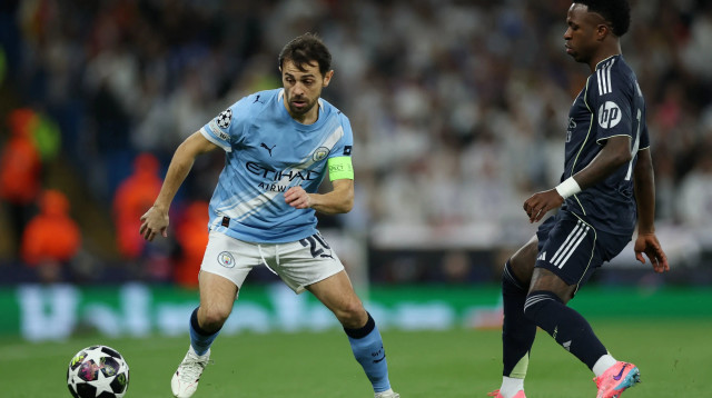 ברנרדו סילבה מול ויניסיוס, מנצ'סטר סיטי מול ריאל מדריד (צילום: רויטרס)