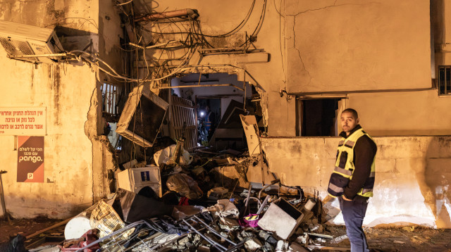 זירת נפילה בגוש דן (צילום: Ilia YEFIMOVICH / AFP via Getty Images)