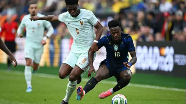 האדום לא עשה את ההבדל. טשאומני מול ויניסיוס (צילום: GettyImages)