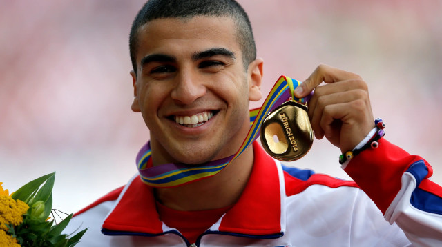 אדם ג'מילי אחרי הזכייה במדליית זהב בריצה ל-200 מטר באליפות אירופה באתלטיקה 2014 (צילום: GettyImages, Dean Mouhtaropoulos)