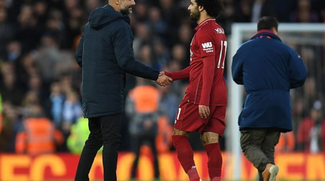 מוחמד סלאח ופפ גווארדיולה במפגש מעונת 2018/19 (צילום: PAUL ELLIS)