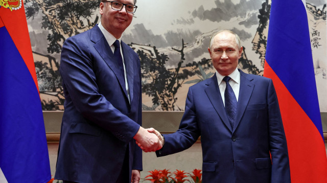 ולדימיר פוטין ואלכסנדר ווצ'יץ' (צילום: רויטרס)