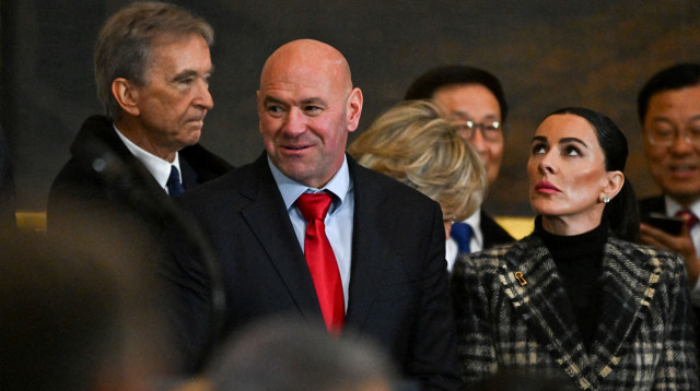 ג'ו רוגן בטקס ההשבעה של טראמפ (צילום: רויטרס)