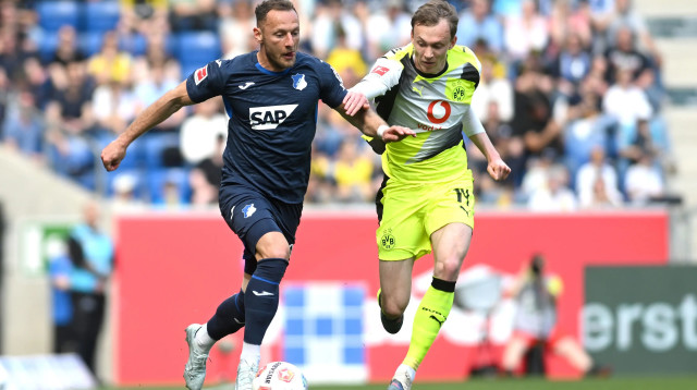 שחקן הופנהיים, ולדימיר צופאל, מול שחקן בורוסיה דורטמונד, מקסימיליאן באואר (צילום: GettyImages, Neil Baynes)