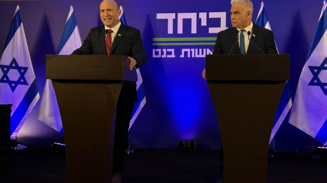 יאיר לפיד ונפתלי בנט מכריזים על איחוד 2026 (צילום: אבשלום ששוני)