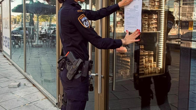 צו סגירה למסעדת אבולעפיה בתל אביב (צילום: דוברות המשטרה)